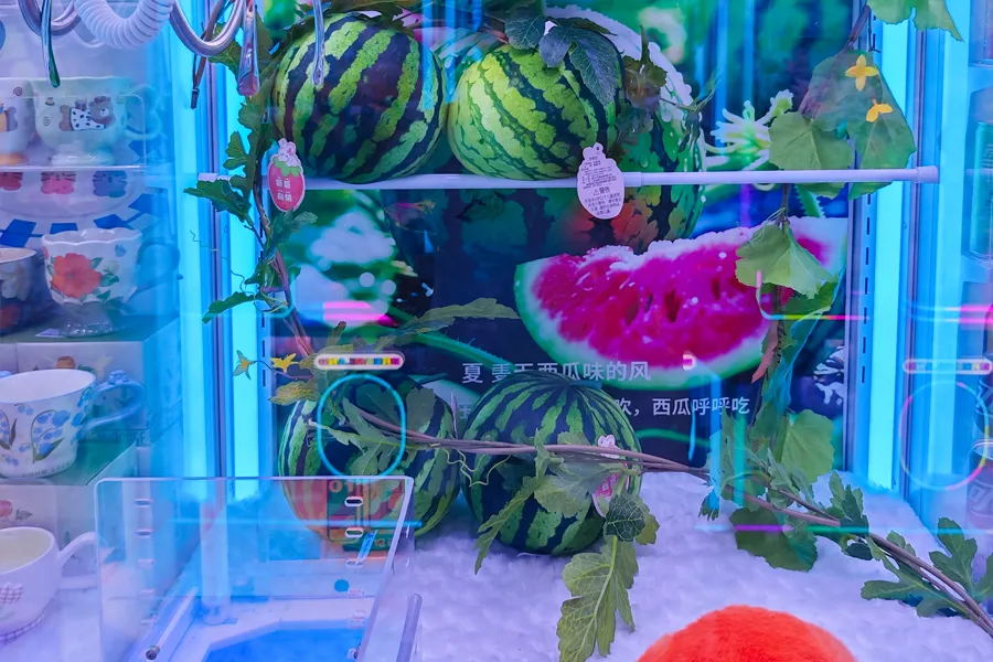 Specialty crane machine display with capsules beverages vouchers food plants and exchange props